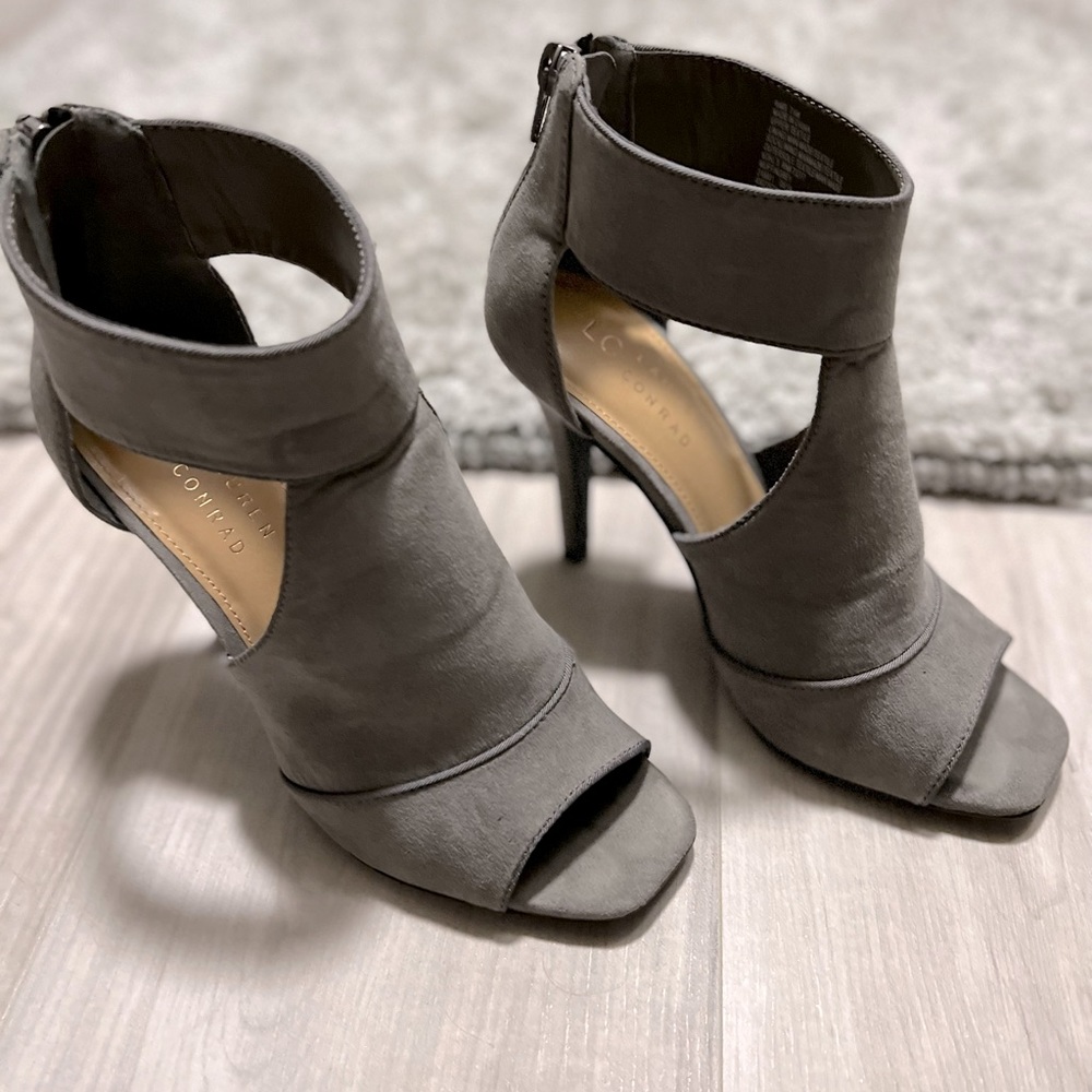 Like new Lauren Conrad peep toe bootie style heels with a 3 inch heel.